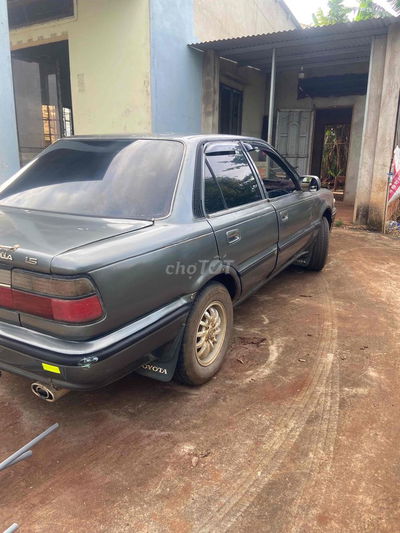 toi cần bán xe Toyota Corolla 1989 - 245000 km