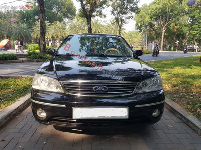 Xe Ford Laser GHIA 1.8 MT 2004