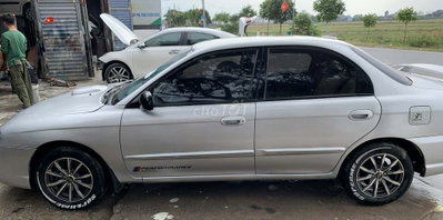 Kia Spectra Bạc