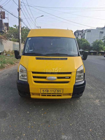 Ford Transit 2011 6 chỗ Vàng