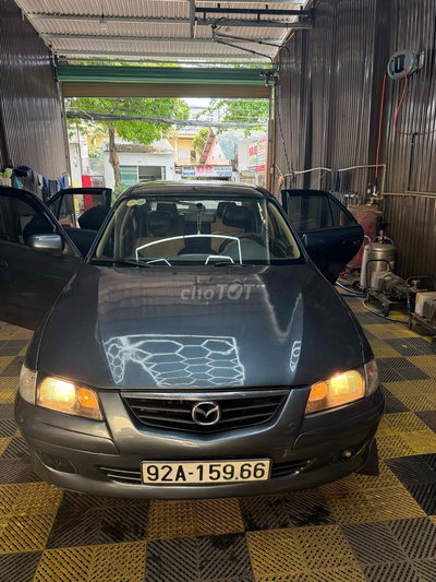 Mazda 626 màu Xám