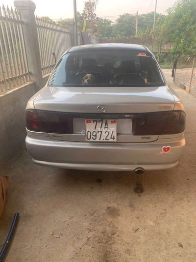 Mazda 323 Bạc số sàn