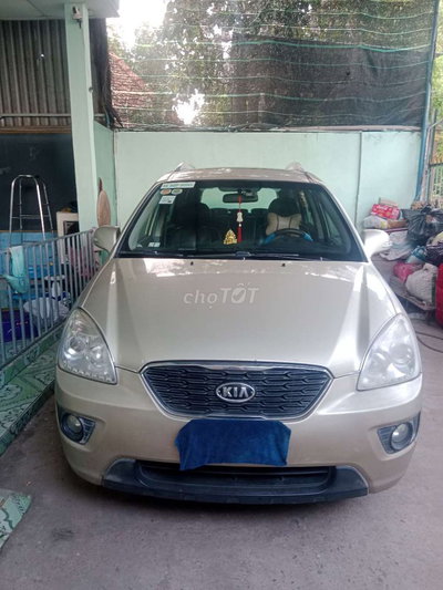 Kia Carens Vàng cát 7 chỗ