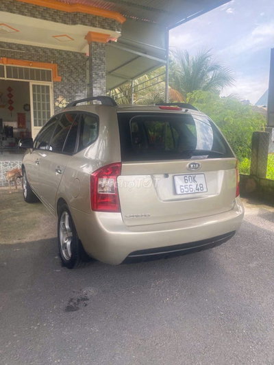 Kia Carens 2010 Vàng