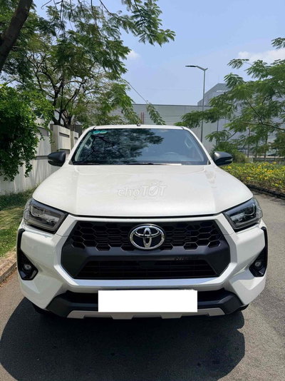 Toyota Hilux 2024 2.4E AT 7.000km Chủ Mua Mới