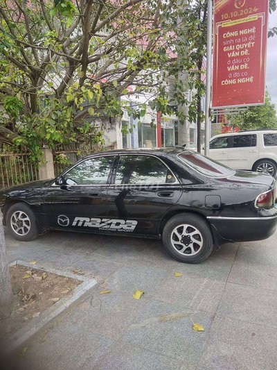 Mazda 626 Đen Số sàn
