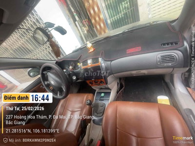 Ford 5 chỗ số sàn màu Bạc