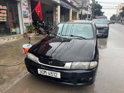 Mazda 323 2000 Đen Số sàn