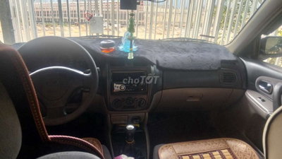 Mazda 323 Đen Số sàn