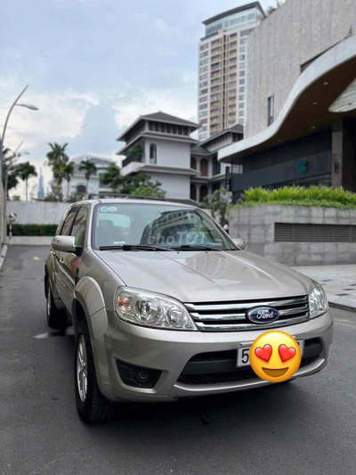 Ford Escape 2009 Vàng cát 32.000km xe cop trùm mên