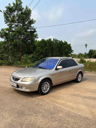 Mazda 323 2003 1.6L Vàng cát