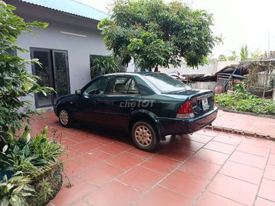 Ford Laser 2001 nồi đồng cối đá