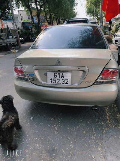 Mitsubishi Lancer 2003 Vàng cát
