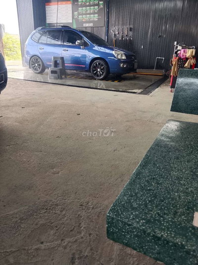 Kia Caren 2011 7 chỗ Xanh