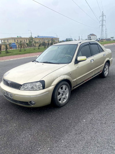 Ford Laser Vàng cát Số sàn
