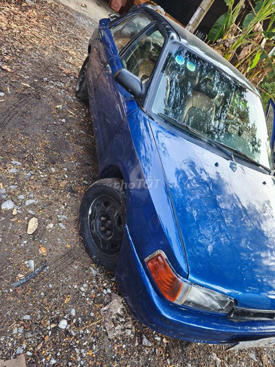 Mazda 323 Xanh Số sàn