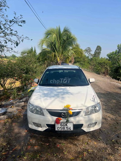 Mazda 323 2003 Trắng số sàn