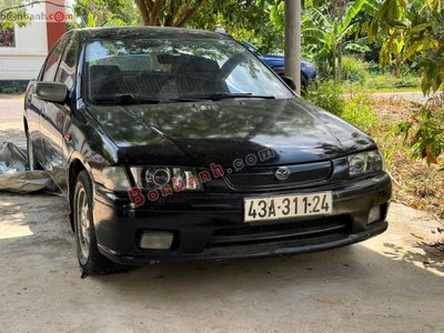 Xe Mazda 323 1.6 MT 1997