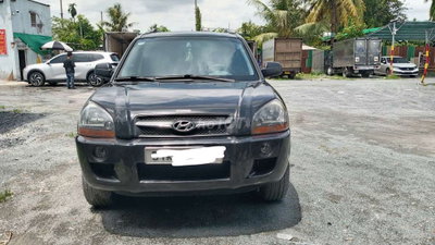Hyundai Tucson 2009 2.0AT 235711 km Đen