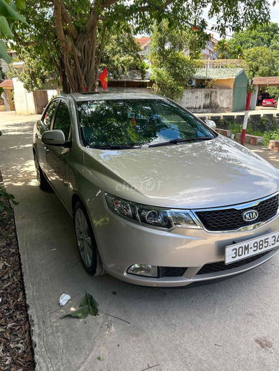 Kia Forte SX 2010 Vàng cát 11000 km