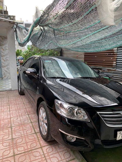 cân ban toyota camry 3.5Qđoi mau đen