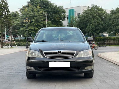 Cần bán Camry 3.0V model 2004 đen cọp đẹp