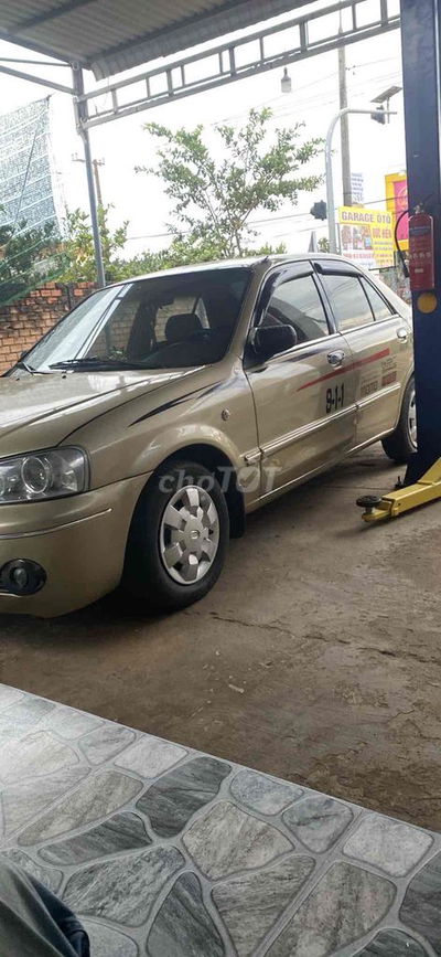 ford laser 1.6 mua bán bao công chứng sang tên